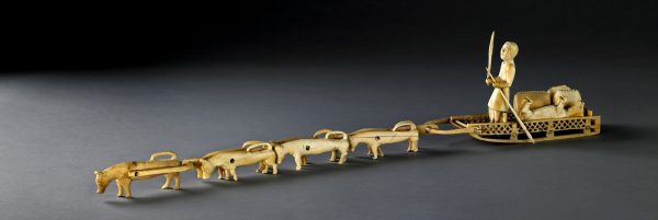 A carved ivory model of a dog sled. Photograph: British Museum