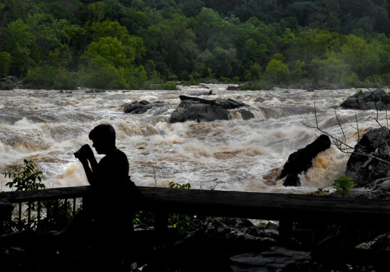 Silhouette of a man standing near the Potomac River