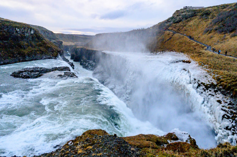 Visitors walking by the Gullfoss Falls