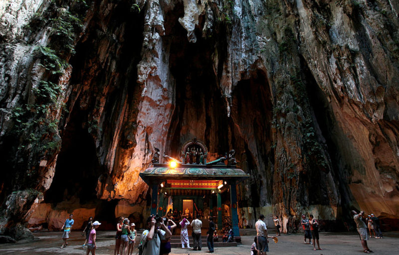 Tourists walking around the Batu Caves
