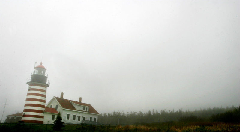 Lighthouse shrouded in fog