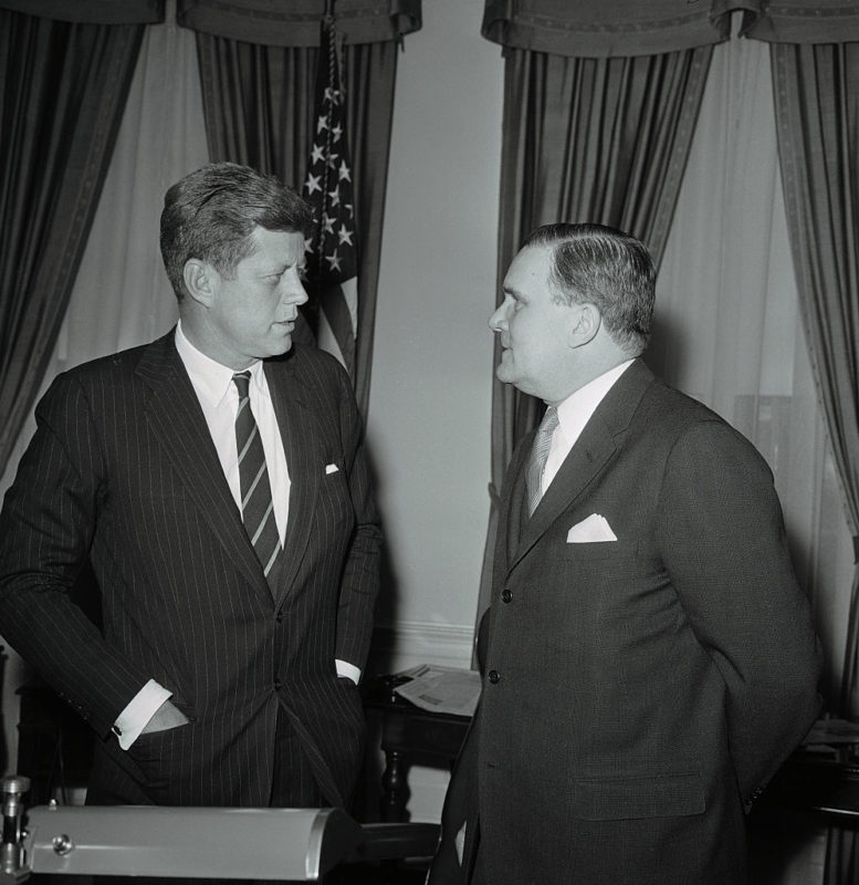 President John F. Kennedy standing with James E. Webb