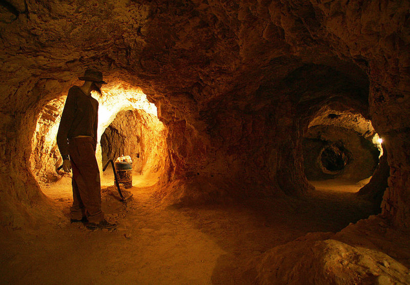 Mannequin dressed as a miner situated within a cave