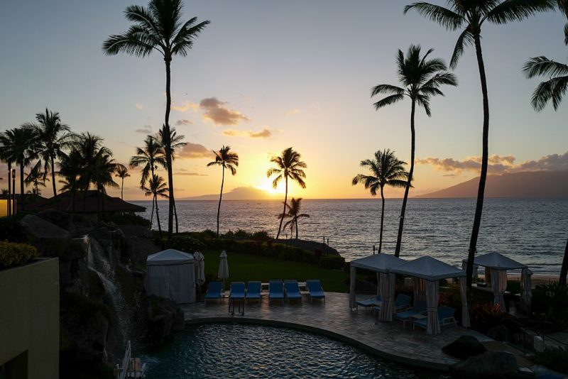 Sun setting over a resort in Maui, Hawaii