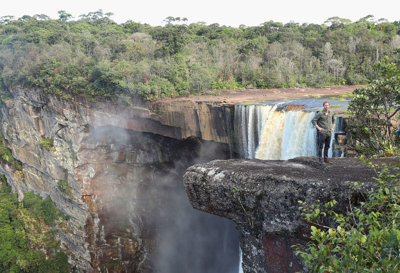 Prince Harry standing near the top of Kaieteur Falls