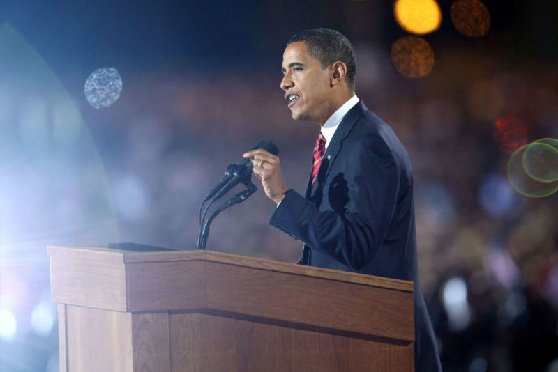 Barack Obama speaking at a podium