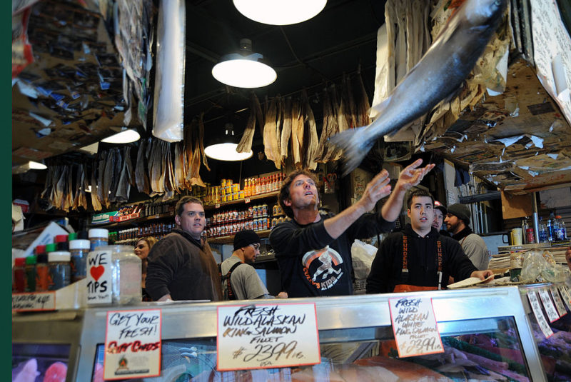 Tourist's flock to see fish get tossed at Seattle's Pike Place Market 