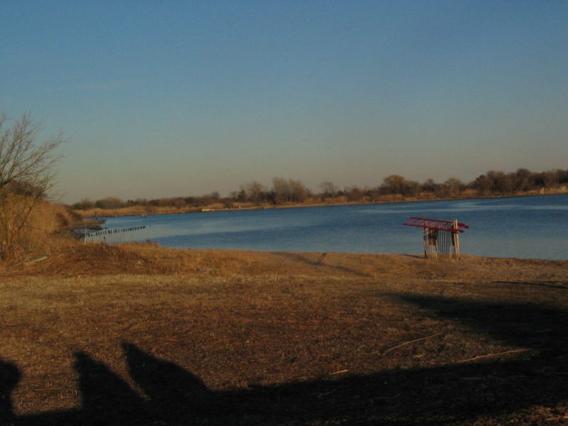 View of the water in the Gateway National Recreation Area at sunset