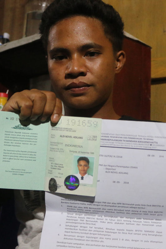 Aldi Novel Adilang holding up his landing permit