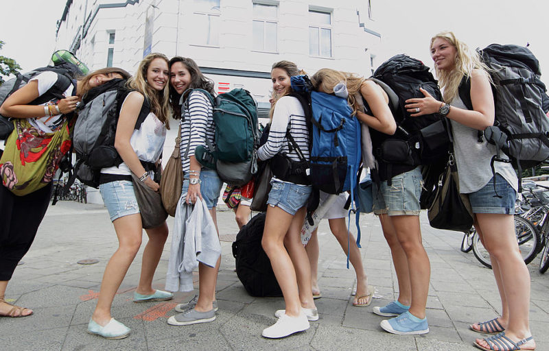 Group of female backpackers standing together