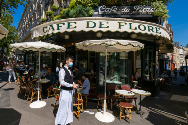 Waiter standing outside of the Café de Flore