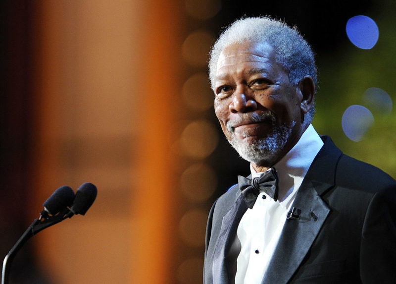 Morgan Freeman standing at a podium