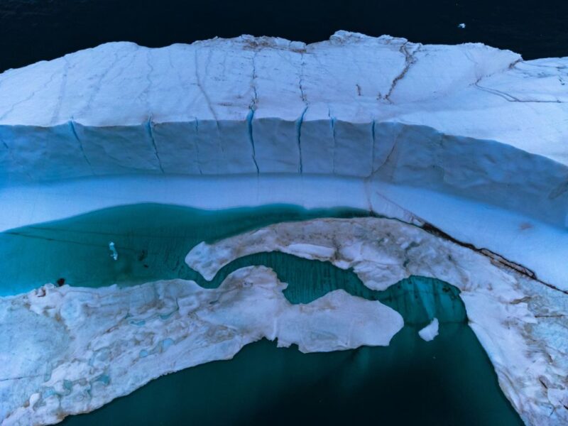 Pond within a melting iceberg